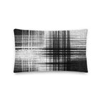 Black and white cushion with vertical and horizontal lines on a white background
