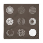 Brown cotton napkins featuring a modern nine-circle pattern