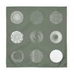 Green cotton napkins featuring a modern nine-circle pattern