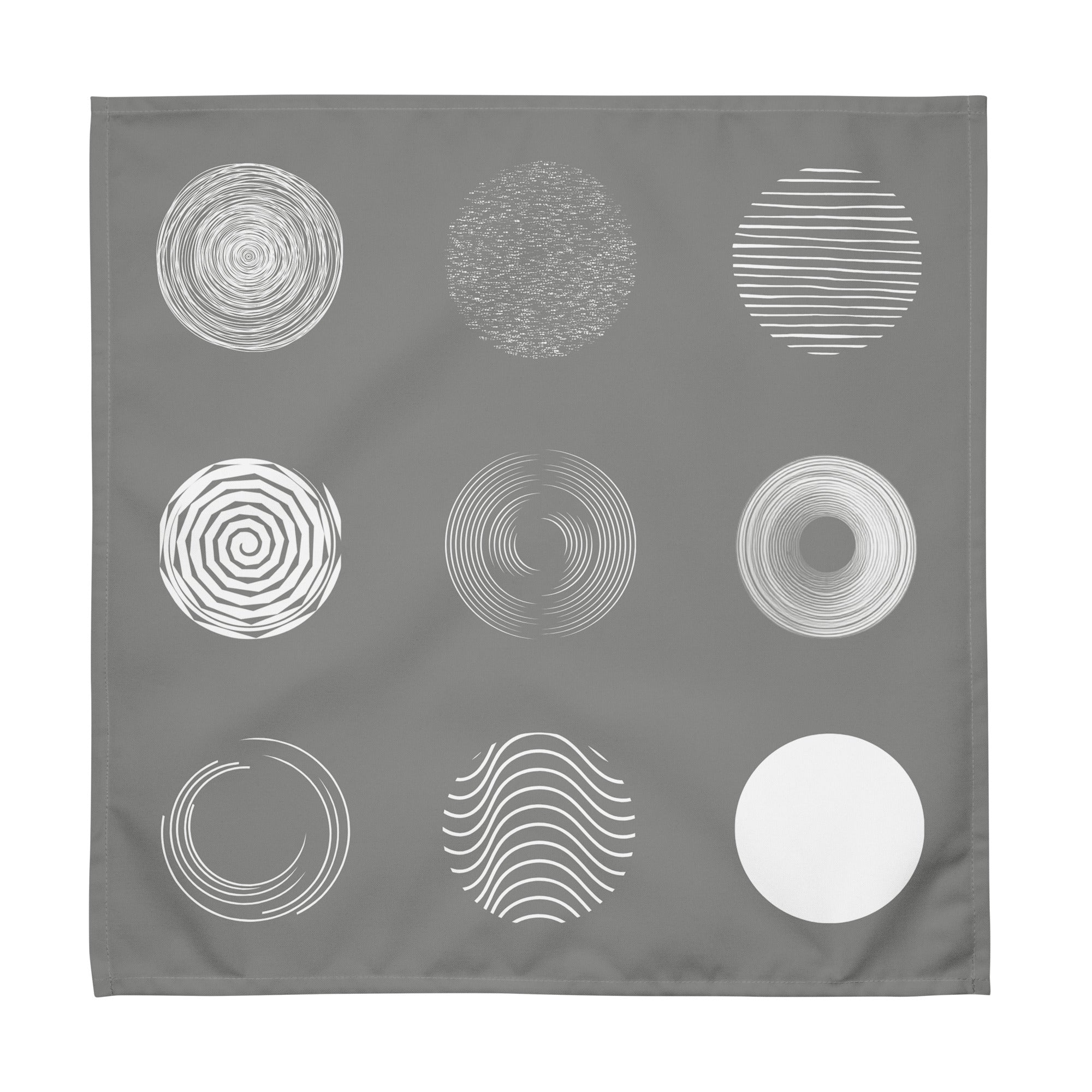 Grey cotton napkins featuring a modern nine-circle pattern