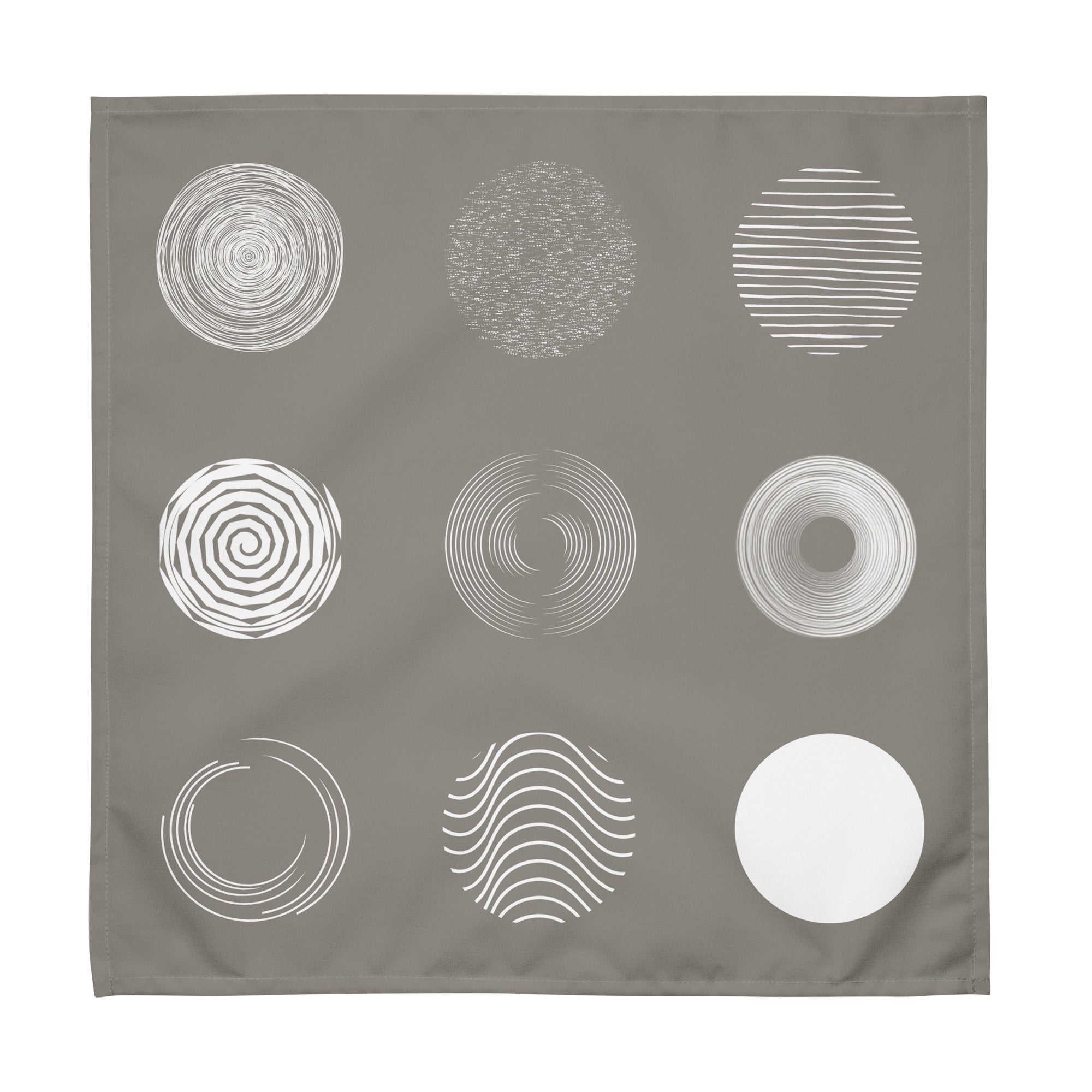 Light brown cotton napkins featuring a modern nine-circle pattern