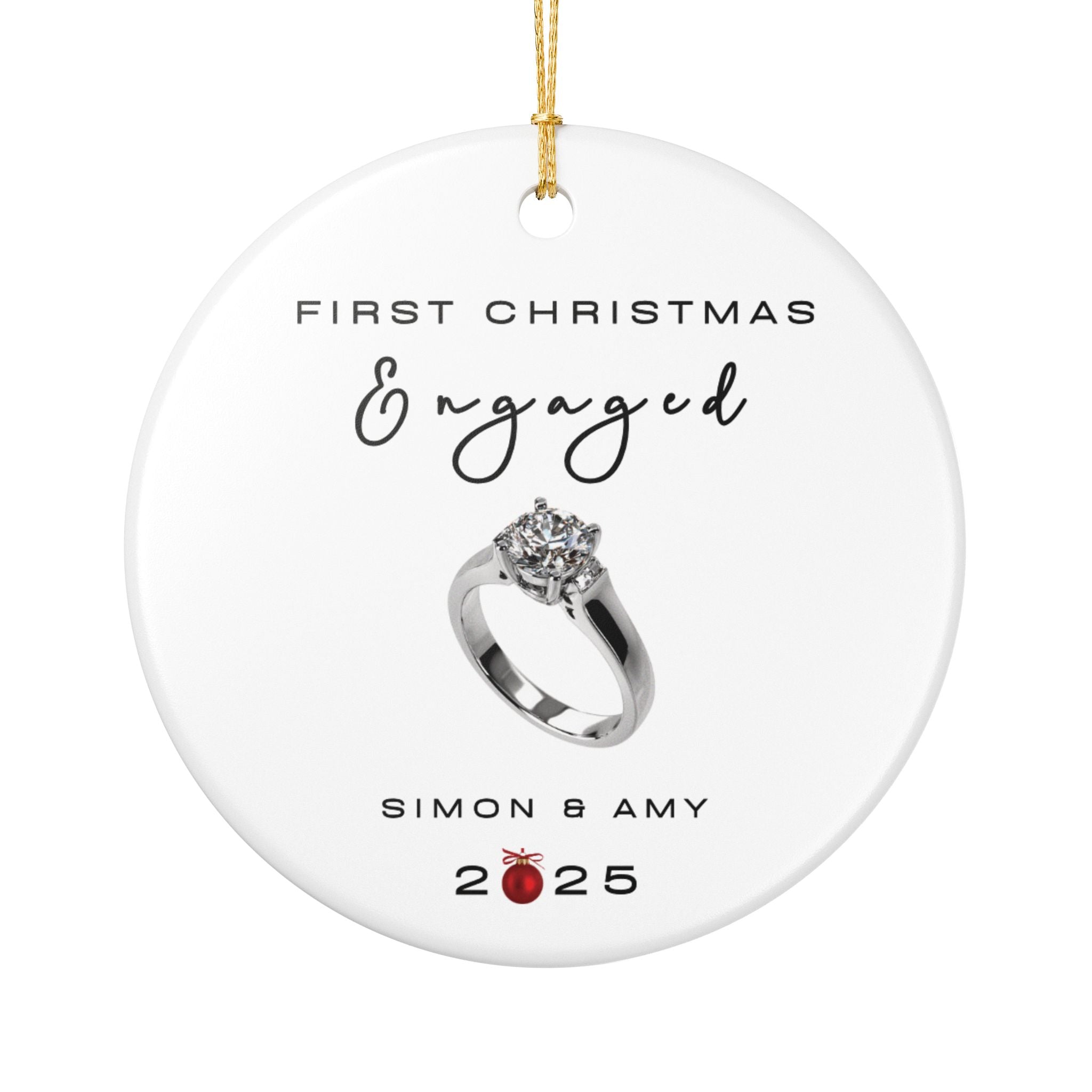 Round ceramic Christmas ornament featuring an engagement ring and the text "First Christmas Engaged" followed by personalised names and the year. White background.