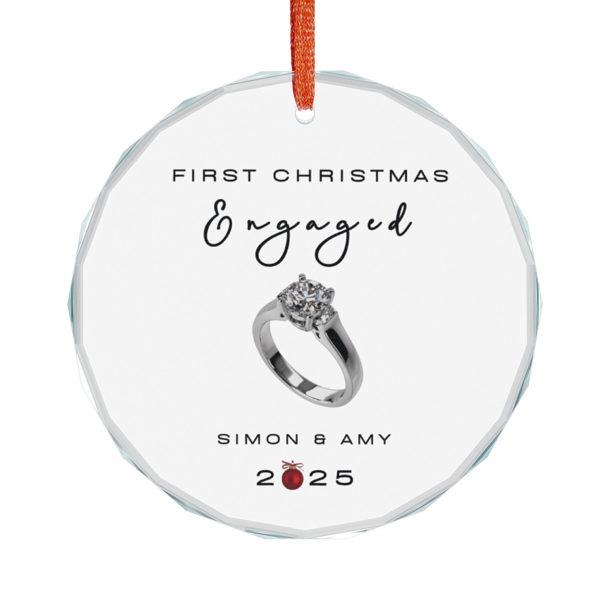 Round crystal glass Christmas ornament featuring an engagement ring and the text "First Christmas Engaged" followed by personalised names and the year. 
