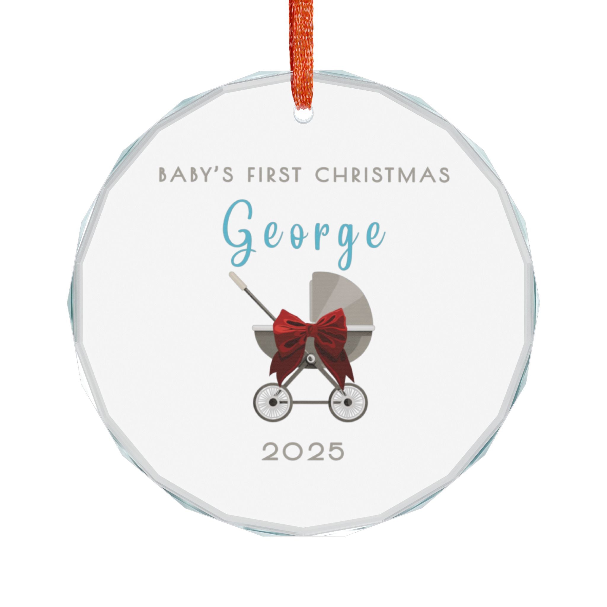 Round crystal glass Christmas ornament featuring a baby carriage (pram) design accented with a red bow. Personalised text includes the baby's name, the year, and the phrase "Baby's First Christmas".  