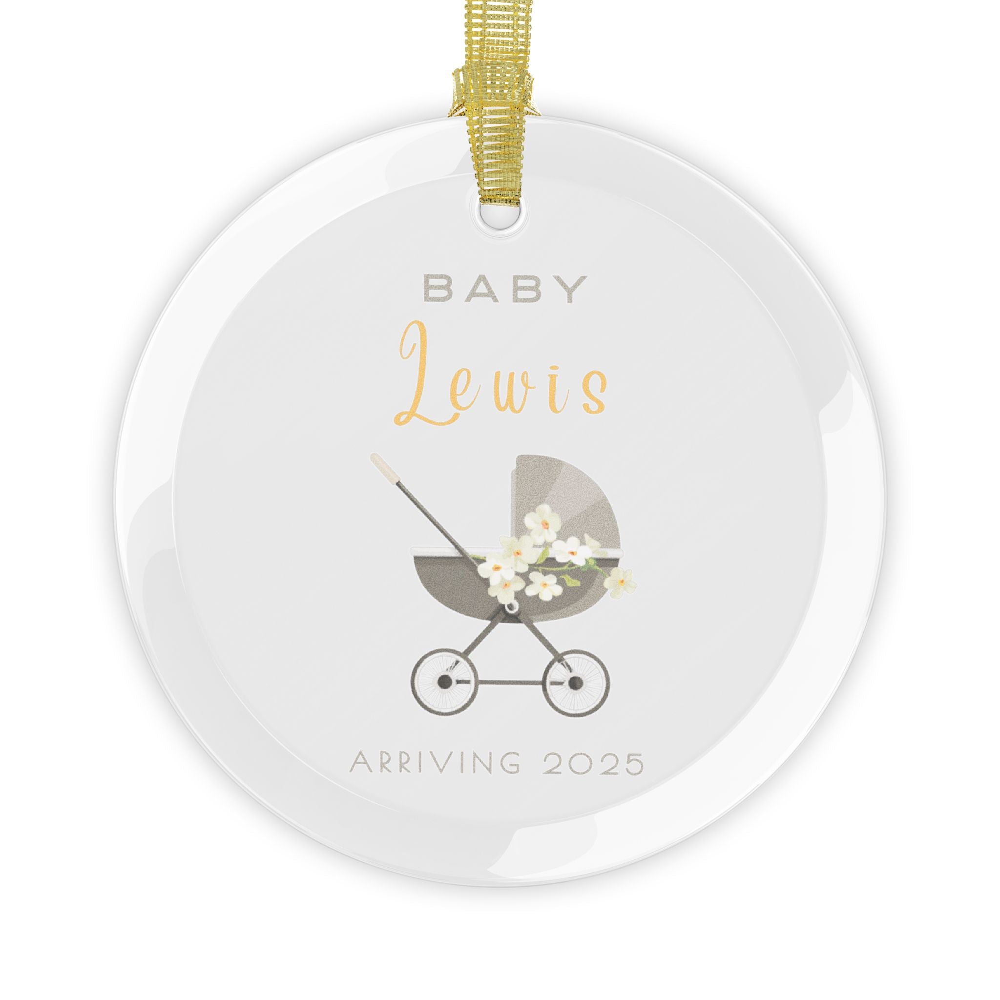 Round glass Christmas ornament featuring a baby carriage (pram) design accented with small flowers. Personalised text includes the baby's name, the year, and the phrases "Baby" and "Arriving."