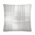 Grey and white cushion with vertical and horizontal lines on a white background