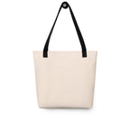 Rear view of a light orange tote bag with black handles featuring the MODERNISTLY logo in white.