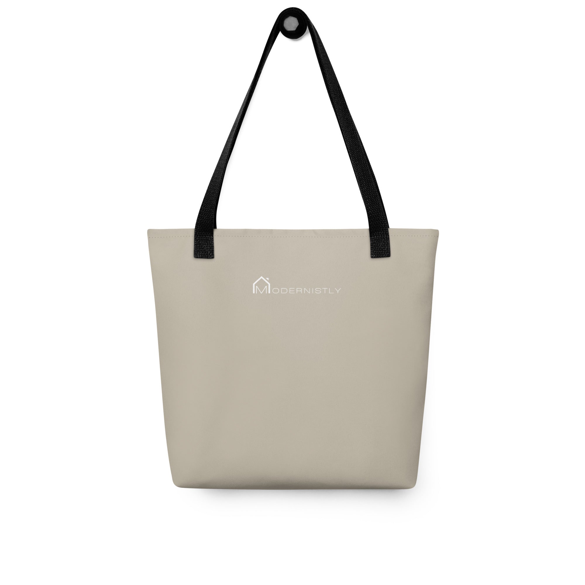 The reverse side of the tote bag, which is solid sand-coloured fabric. The back is plain except for the company logo, which is centered in white.