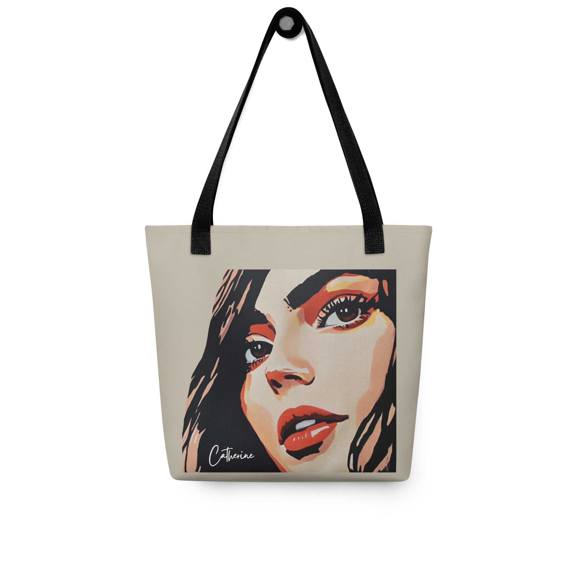 A sand coloured tote bag with an  illustration of a woman's face. Below the face is a visible space for custom text, for "Your Name." The bag has two  black handles for carrying.