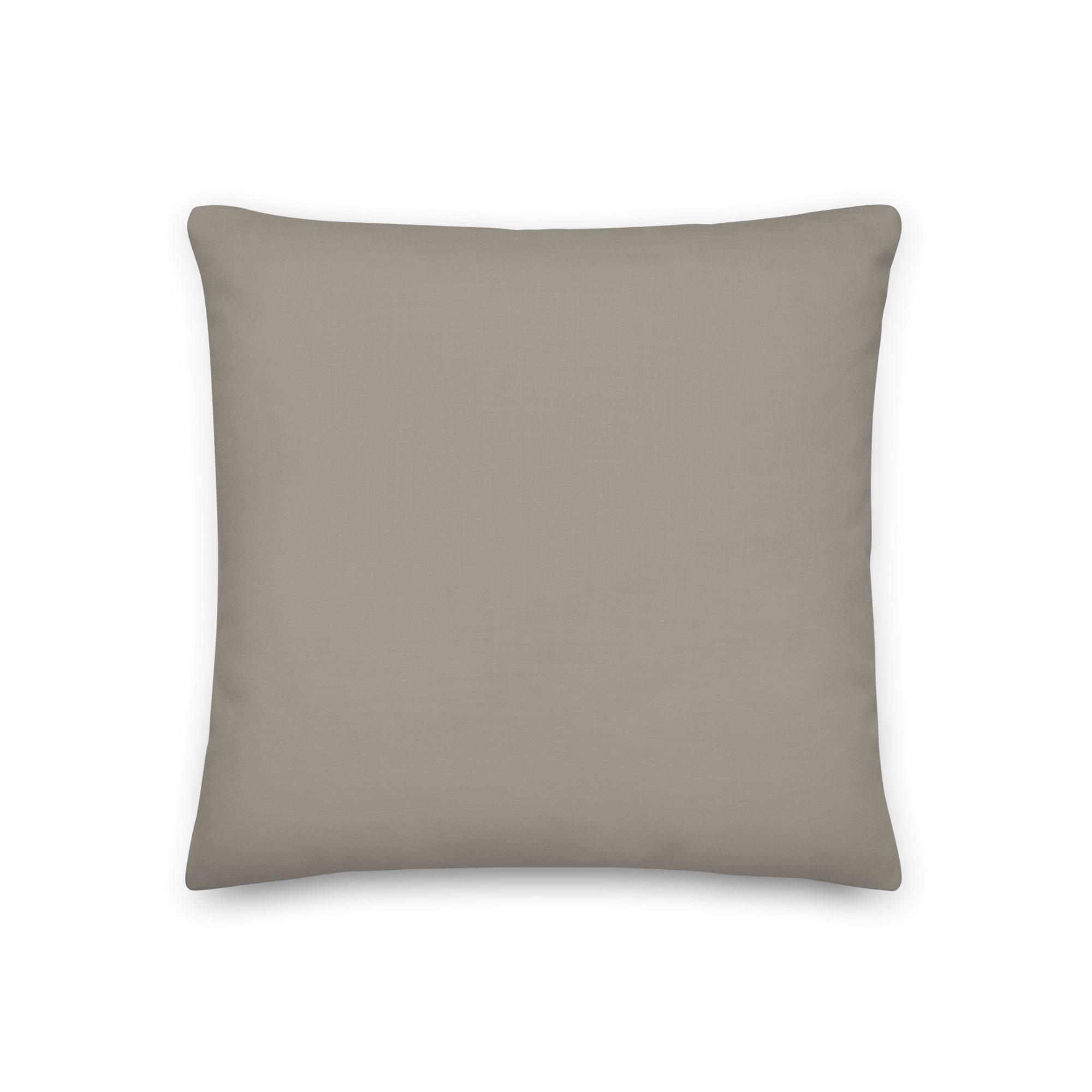 Back view of the cushion, showing the solid sand colour fabric.