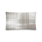 Sand and white cushion with vertical and horizontal lines on a white background