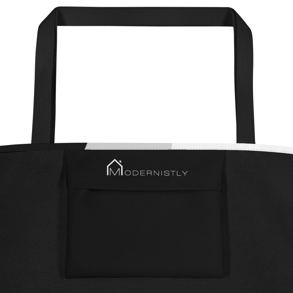 Inside pocket of the tote bag with the MODERNISTLY company logo.