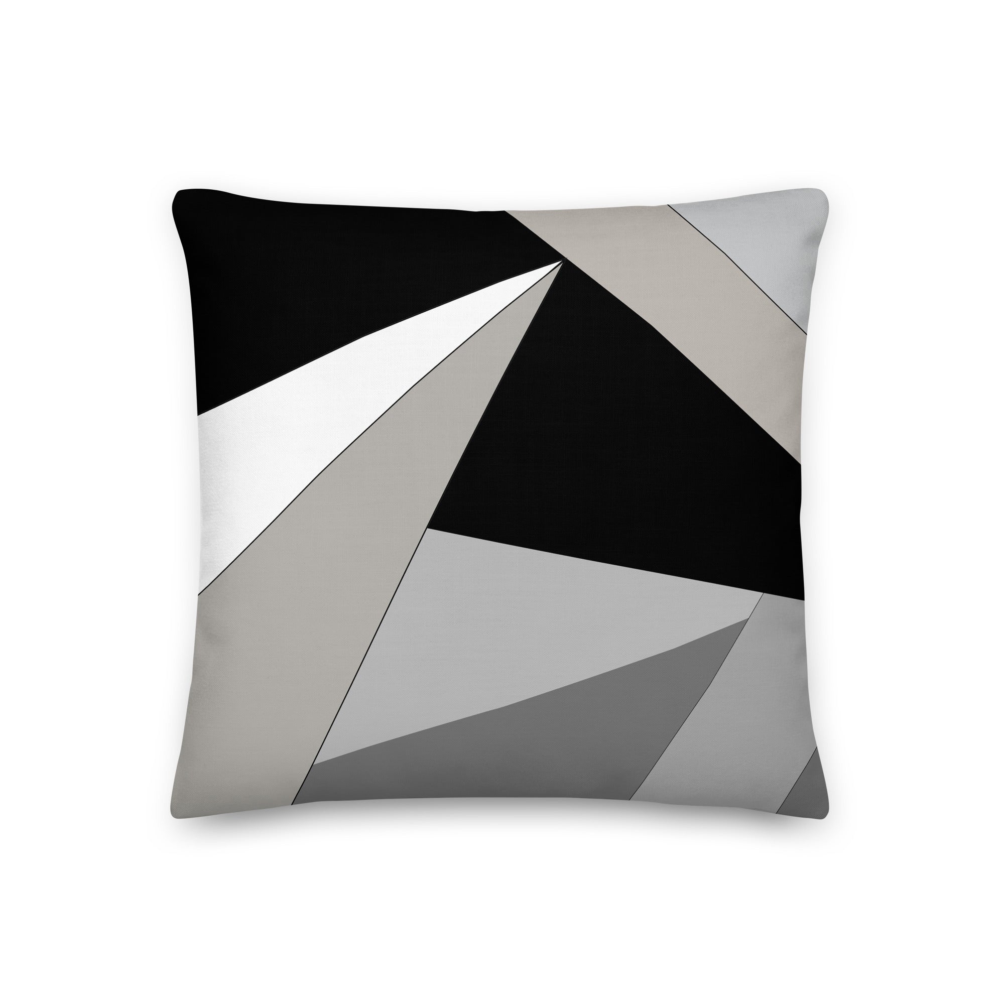 Front view of a cushion with geometric pattern made of triangles in shades of black, grey, sand and white.