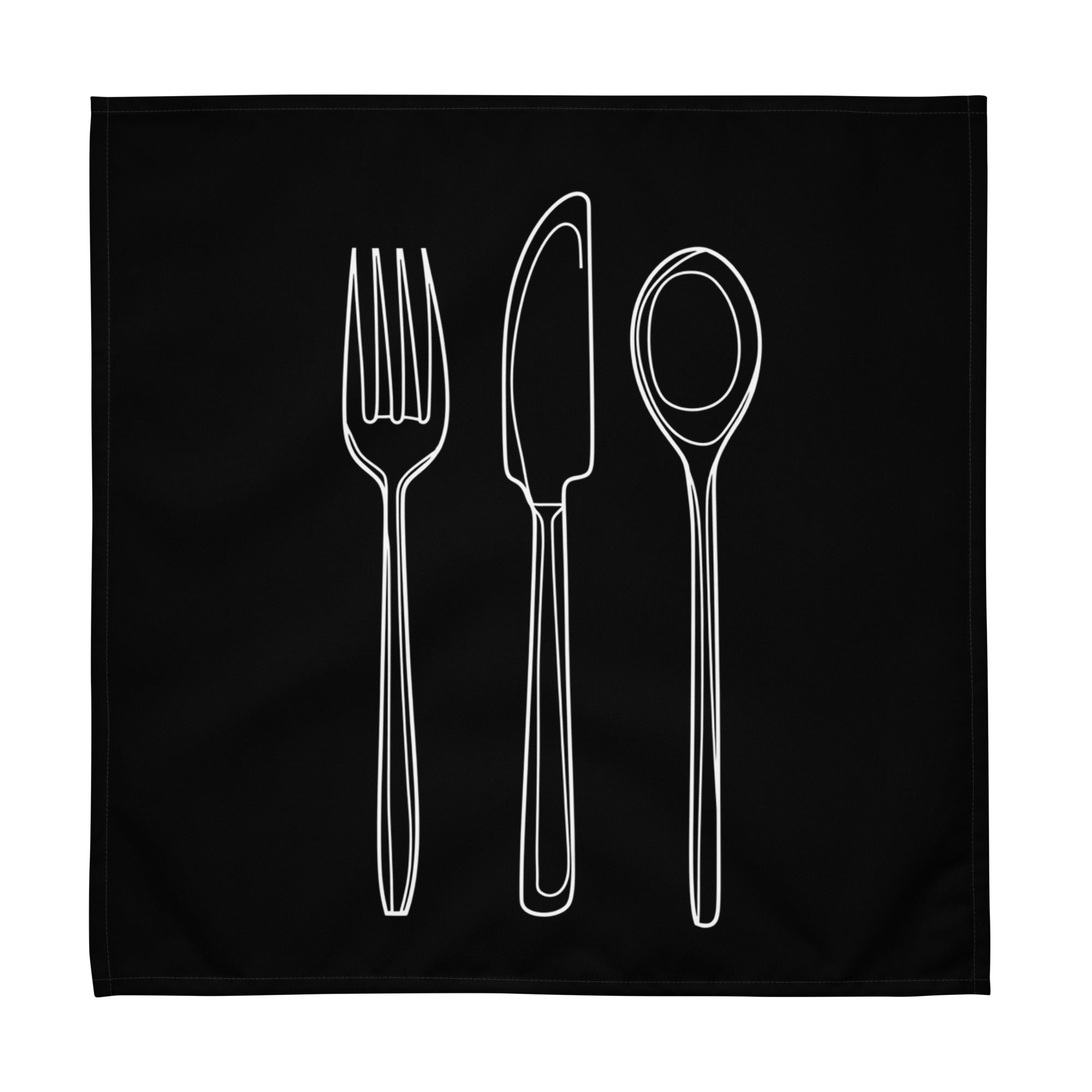 Black cloth napkin with a detailed white drawing of a fork, knife, and spoon stacked vertically down the center.