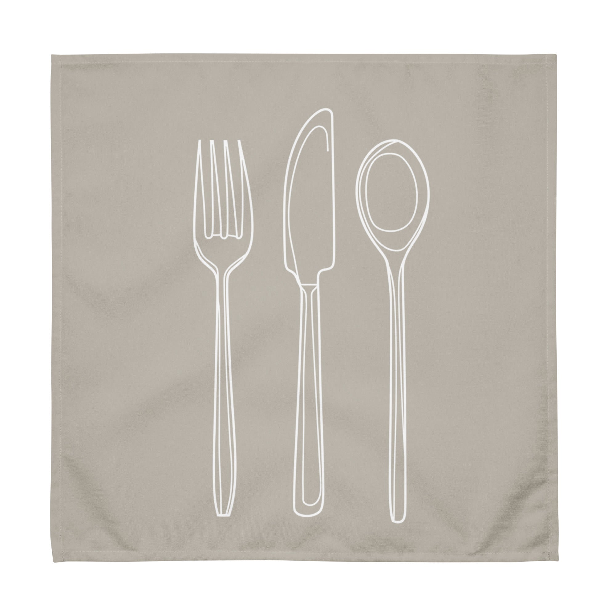 Sand colour cloth napkin with a detailed white drawing of a fork, knife, and spoon stacked vertically down the center.